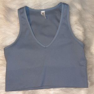V cut blue cropped tank top